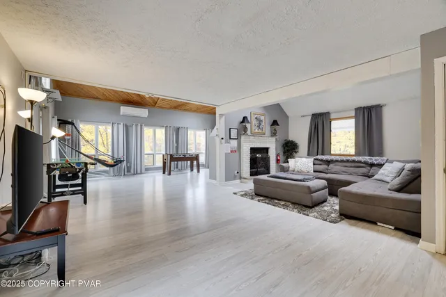 a kitchen with granite countertop a sink and cabinets