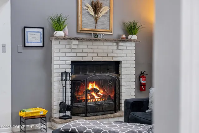 a kitchen with a table and chairs in it