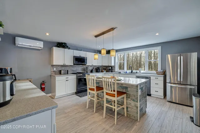 a kitchen with a sink and a window