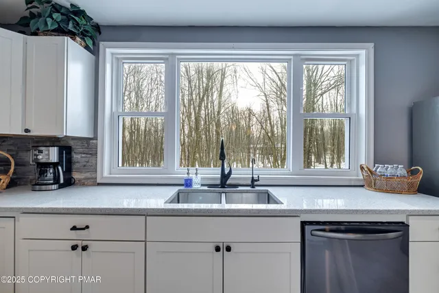 a view of entryway with stairs