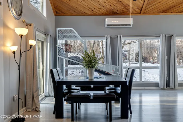 a bedroom with a bed and a desk