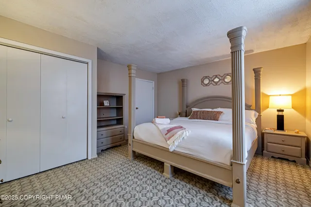 a view of a deck with table and chairs with wooden floor