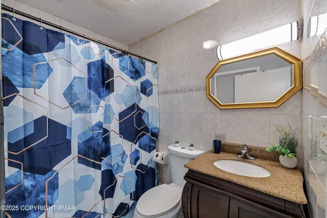 a swimming pool with trees in the background