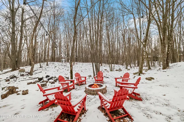 a view of a house with wooden deck