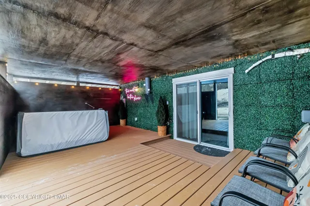 a view of livingroom with furniture and floor to ceiling window