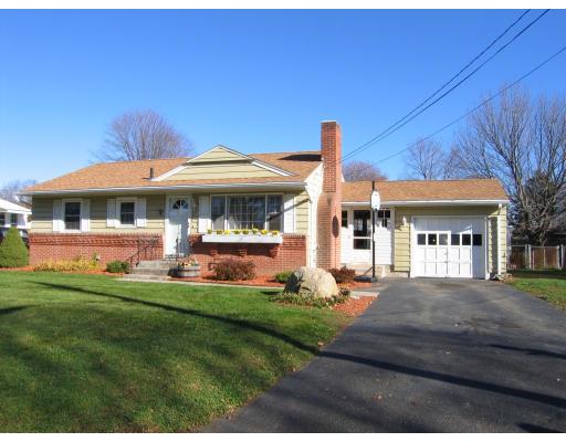 31 Melba Street Springfield, MA 01119 - Photo 1 of 14 a front view of a house with a yard