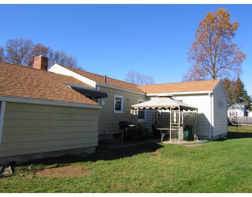31 Melba Street Springfield, MA 01119 - Photo 3 of 14 a view of a house with a yard