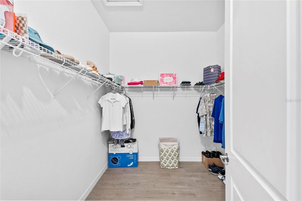 17341 Sandpearl Road Venice, FL 34293 - Photo 30 of 95 a view of storage and utility room with two washing machine