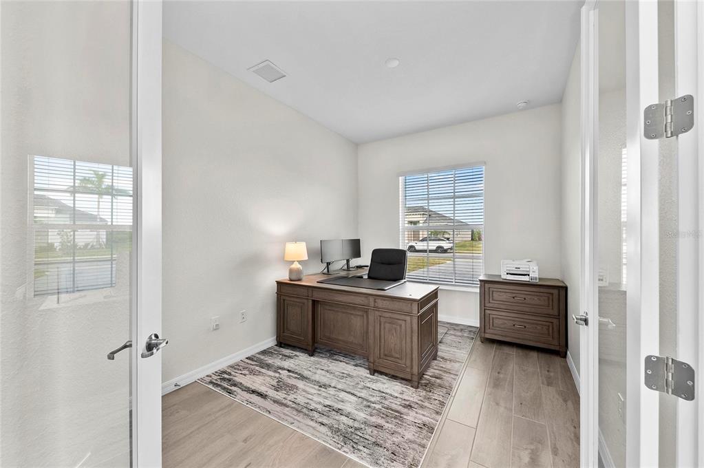 17341 Sandpearl Road Venice, FL 34293 - Photo 46 of 95 a view of a workspace with furniture and window