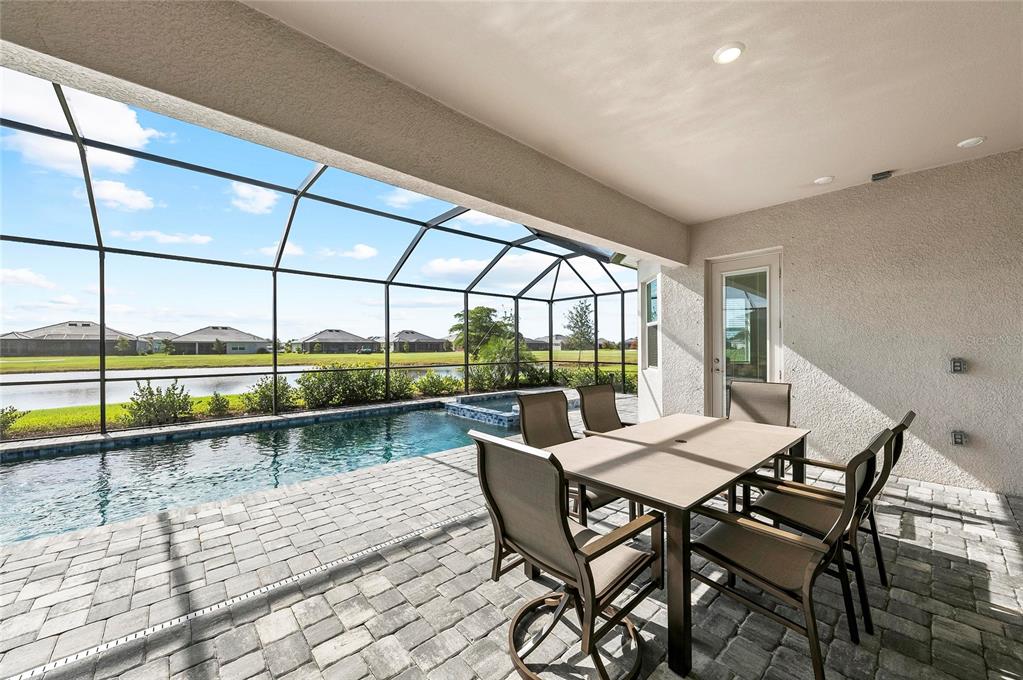 17341 Sandpearl Road Venice, FL 34293 - Photo 53 of 95 a view of a dining room with furniture window and outside view