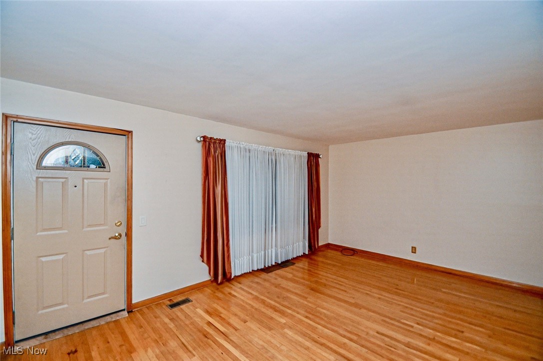 4858 Arbor Road Southwest Canton, OH 44710 - Photo 18 of 31 Foyer entrance with light hardwood / wood-style floors