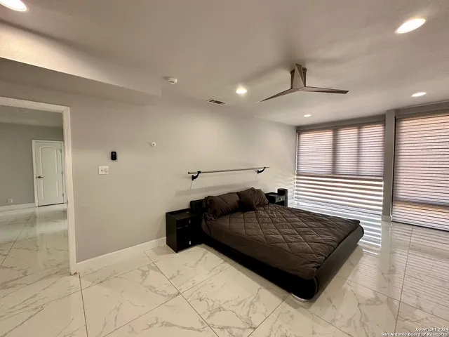 a living room with a couch and a table