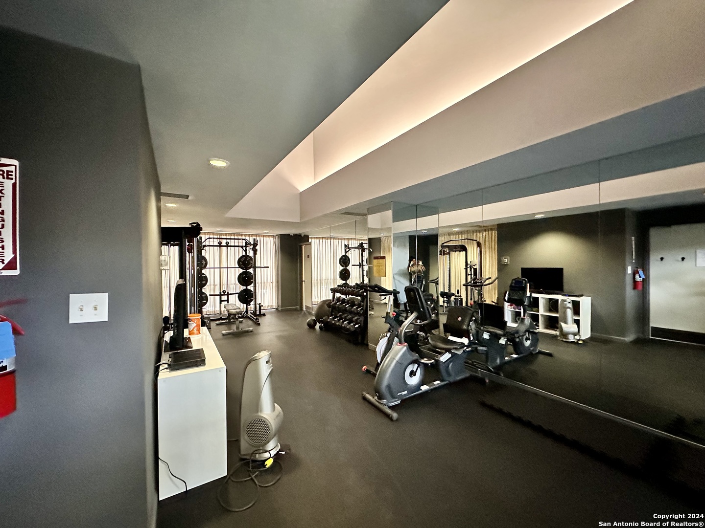 7701 Wurzbach Road, Unit 2301 San Antonio, TX 78229 - Photo 30 of 36 a view of a room with gym equipment