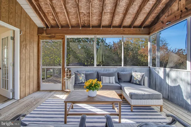 a kitchen with refrigerator and window