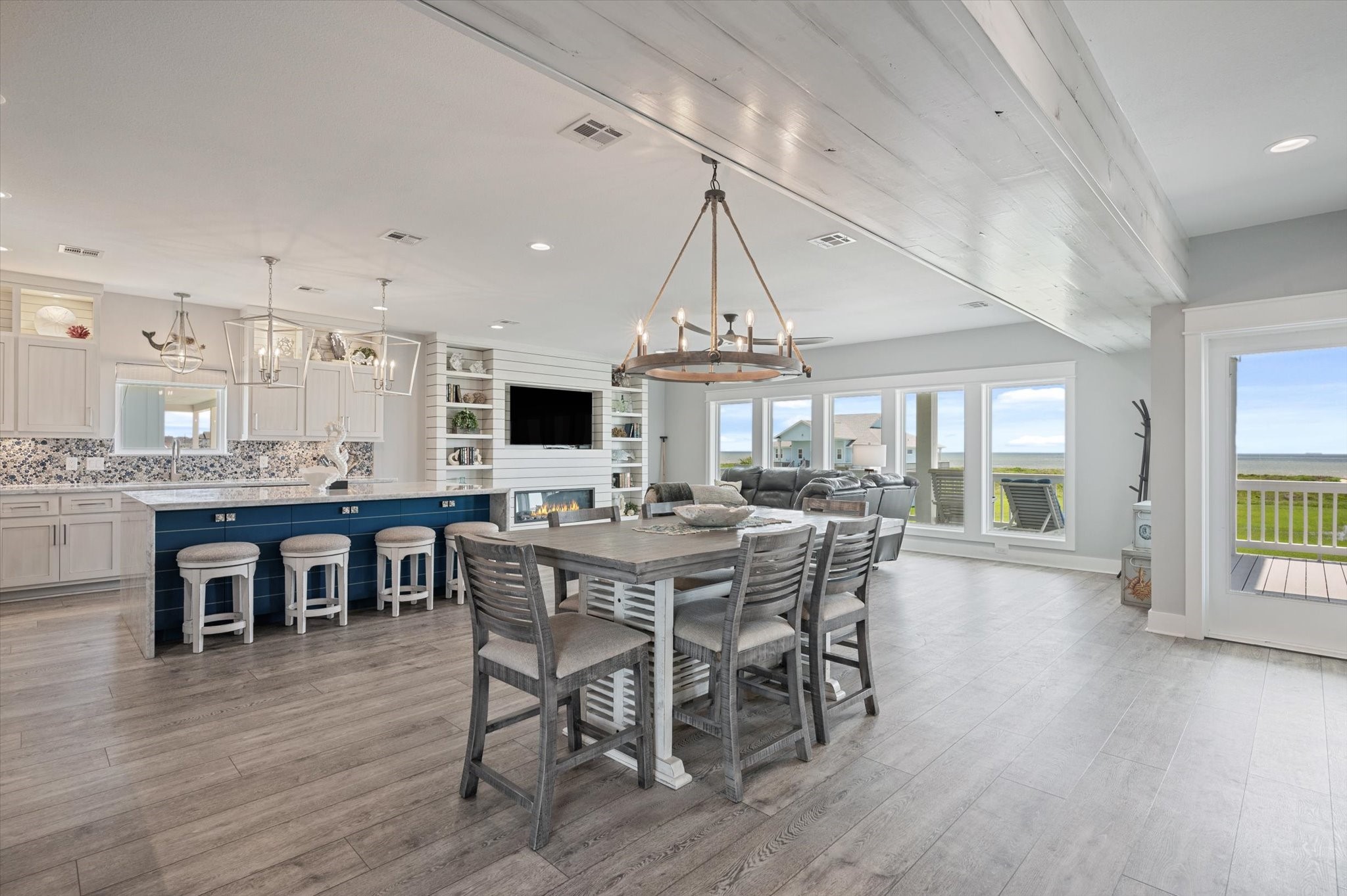 3701 Biscayne Beach Road Port Bolivar, TX 77650 - Photo 19 of 50 a view of a dining room with furniture window and wooden floor