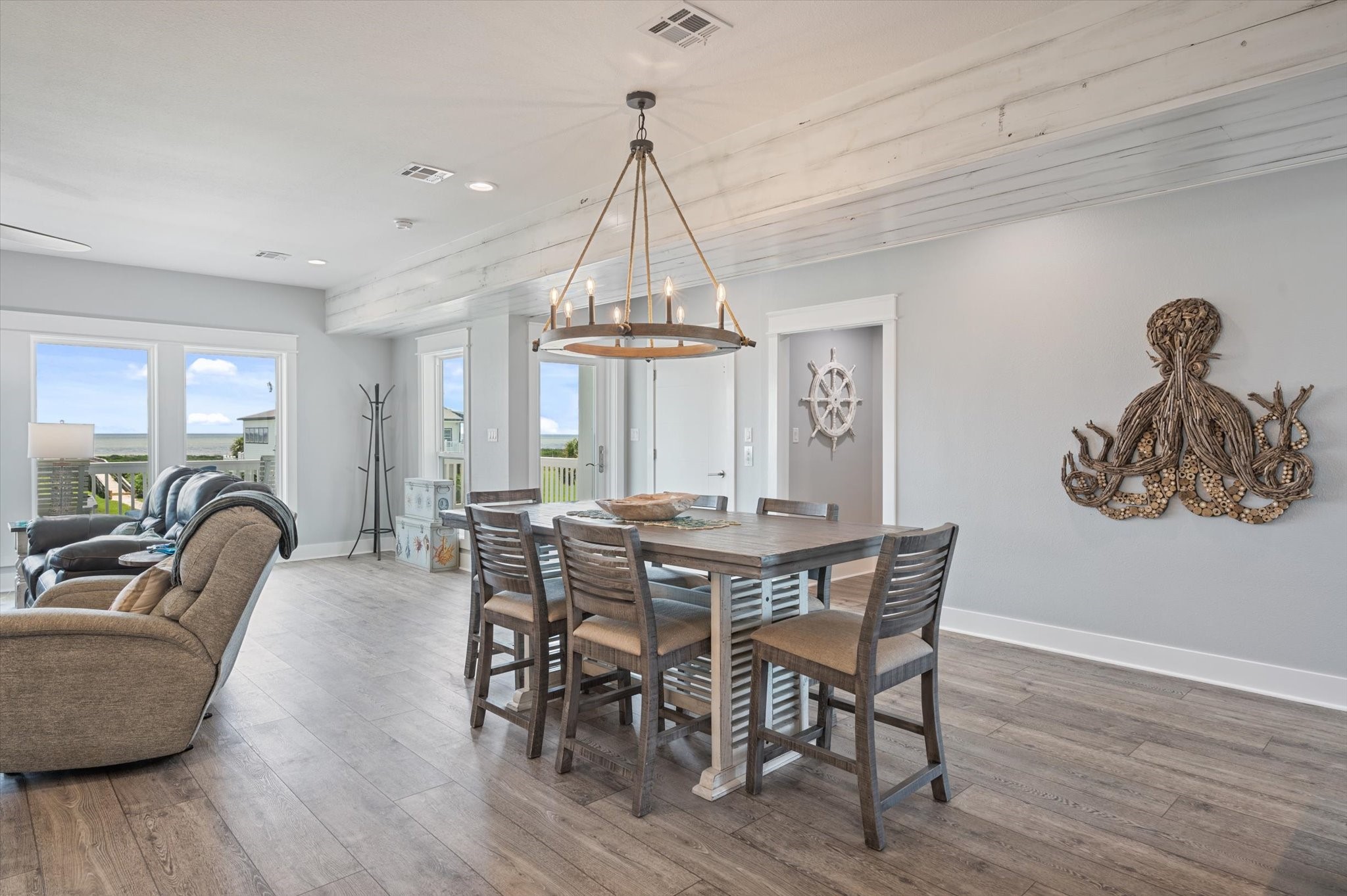 3701 Biscayne Beach Road Port Bolivar, TX 77650 - Photo 20 of 50 a view of a dining room with furniture window and wooden floor