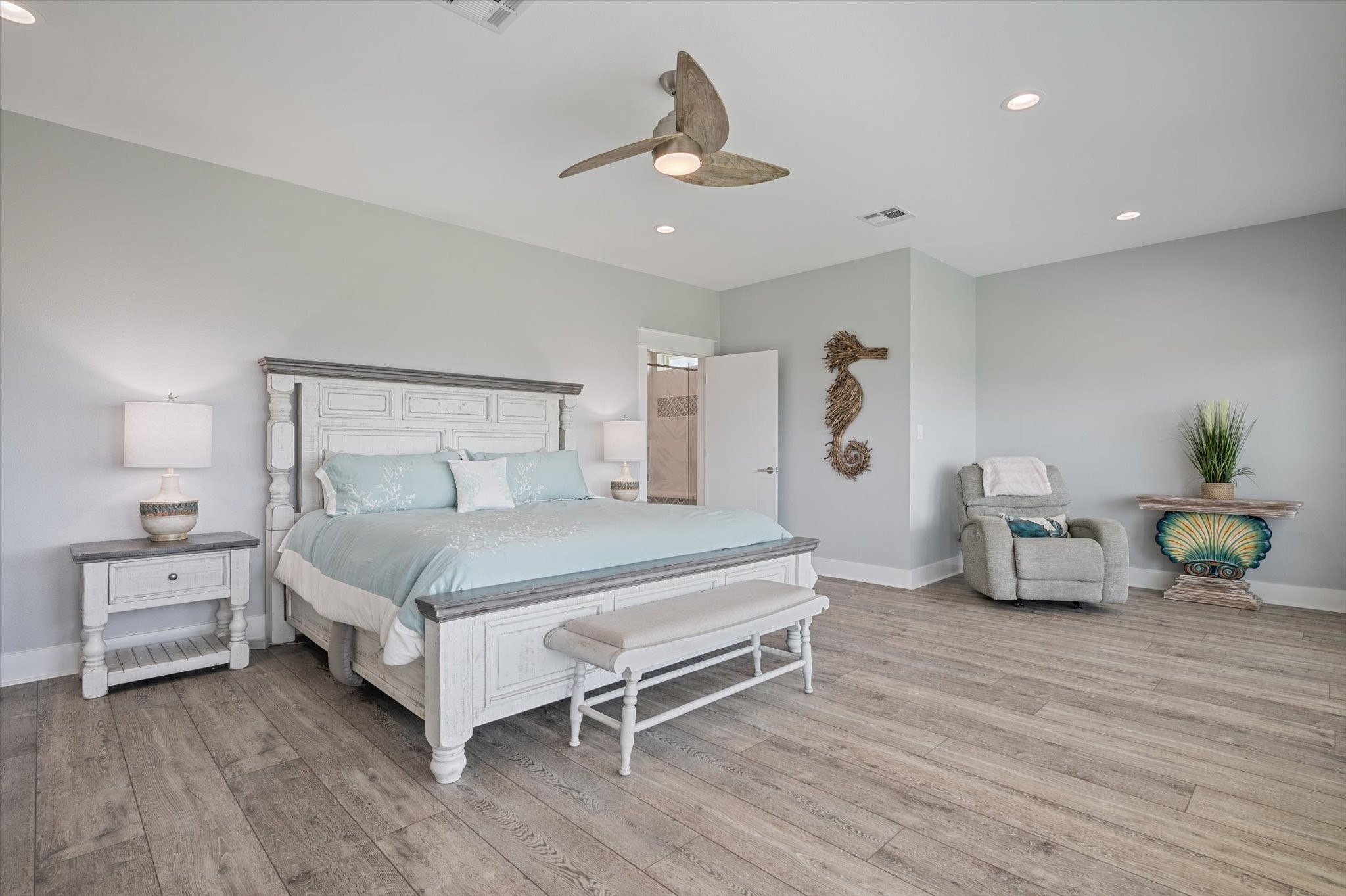 3701 Biscayne Beach Road Port Bolivar, TX 77650 - Photo 34 of 50 a bedroom with a bed and a chandelier