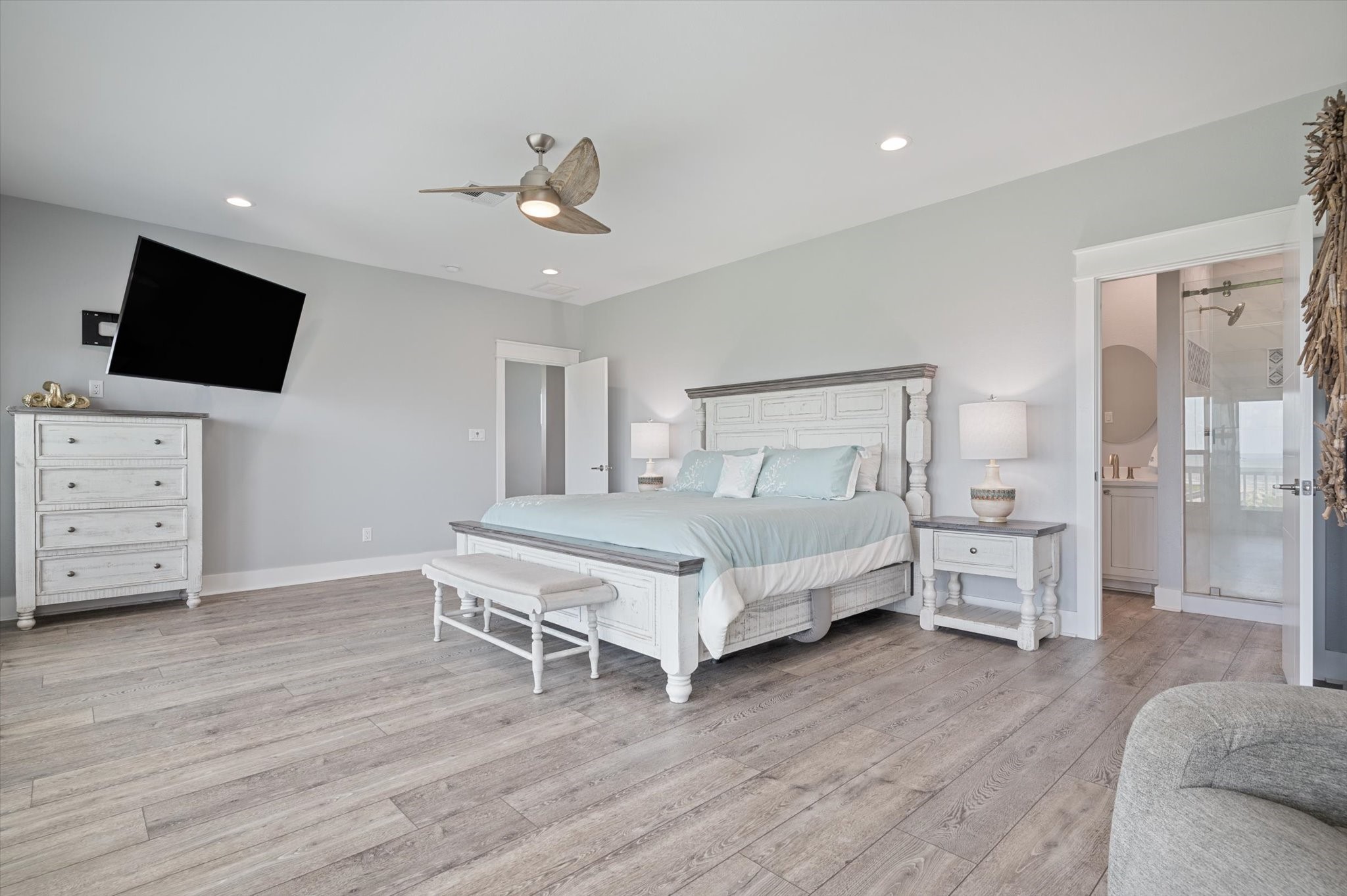 3701 Biscayne Beach Road Port Bolivar, TX 77650 - Photo 35 of 50 a bedroom with a bed and flat screen tv