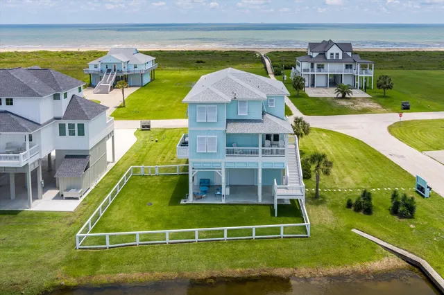 a view of balcony with furniture