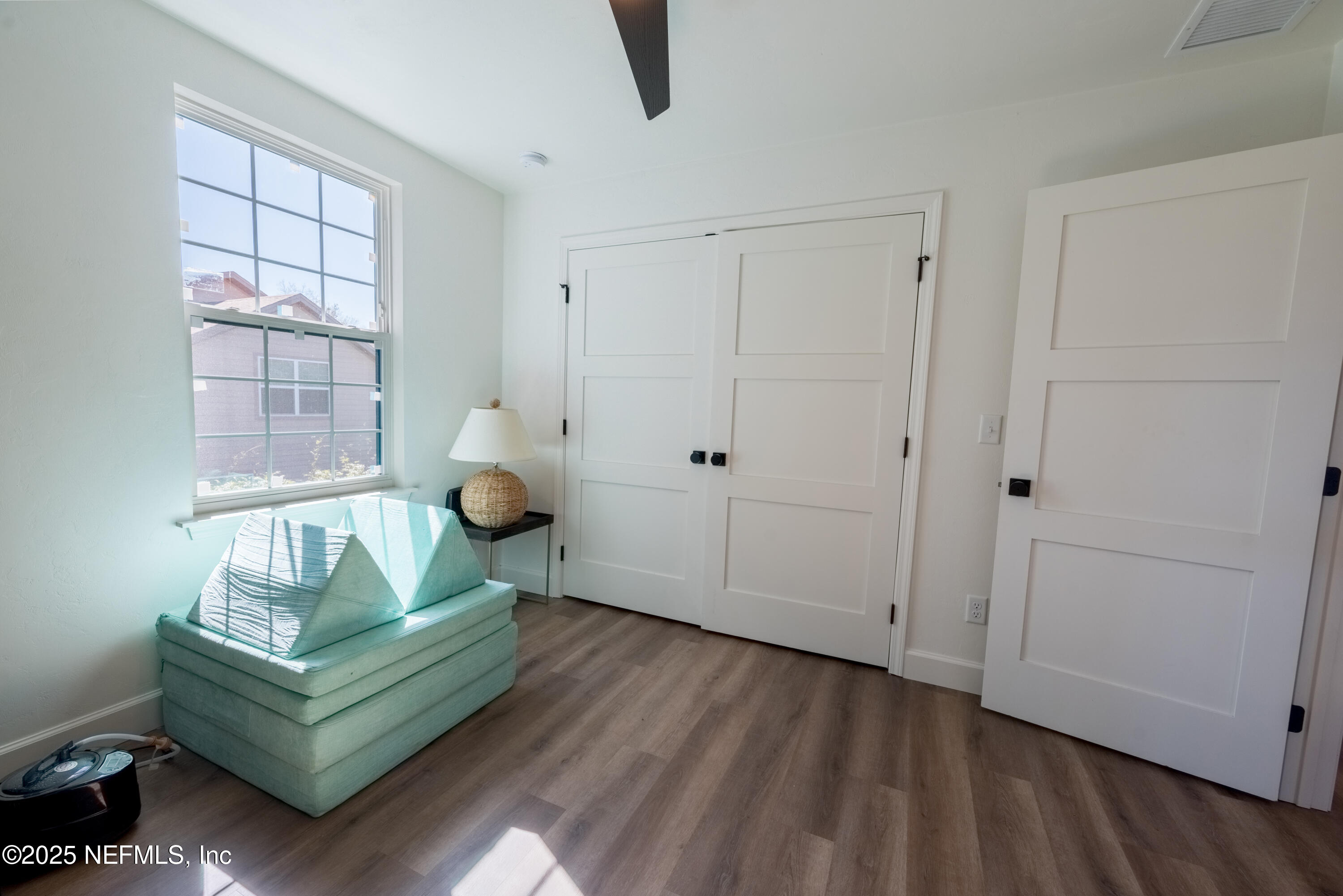 10435 Southwest 80th Place Hampton, FL 32044 - Photo 39 of 57 a living room with furniture and wooden floor