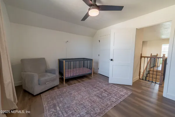 a view of a yard with a tree