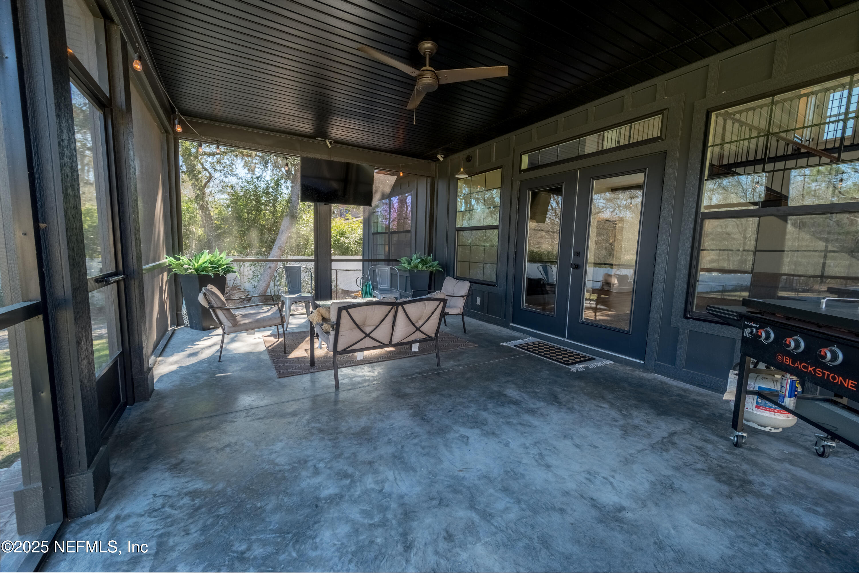 10435 Southwest 80th Place Hampton, FL 32044 - Photo 45 of 57 a view of a porch with chairs and backyard