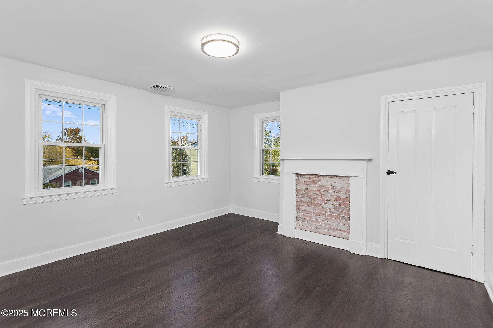 36 Chest-Georgetown Road Columbus, NJ 08022 - Photo 34 of 56 an empty room with wooden floor cabinet and windows