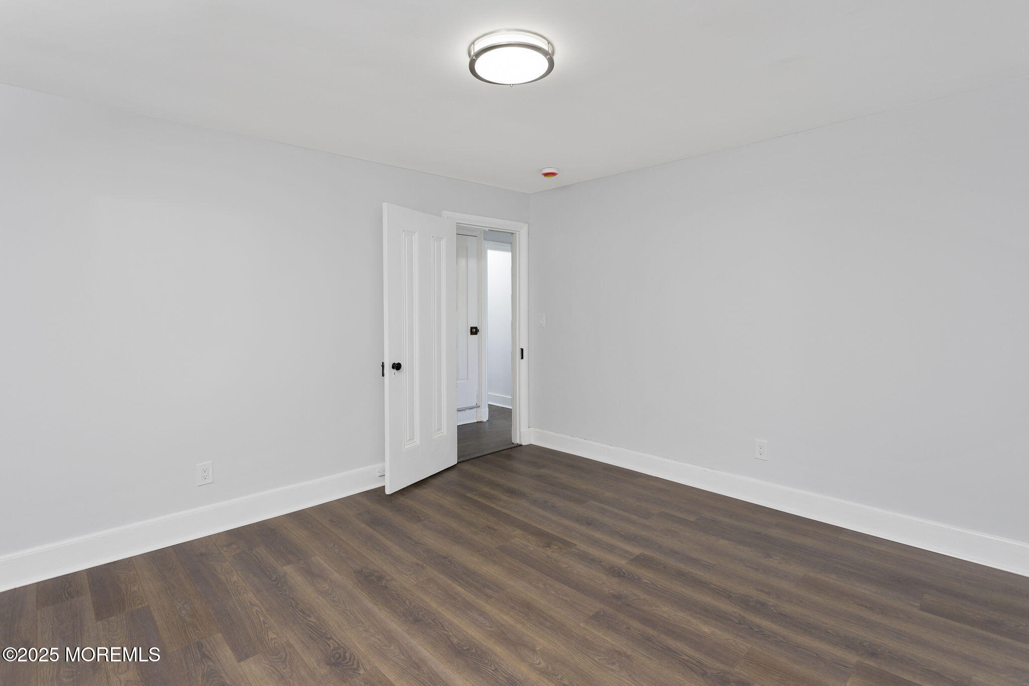 36 Chest-Georgetown Road Columbus, NJ 08022 - Photo 41 of 56 a view of an empty room with wooden floor and a window