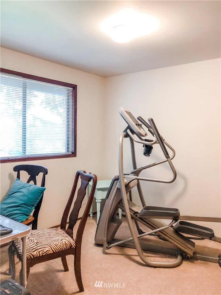 2121 Chestnut Street Everett, WA 98201 - Photo 11 of 21 a room with gym equipment and white walls