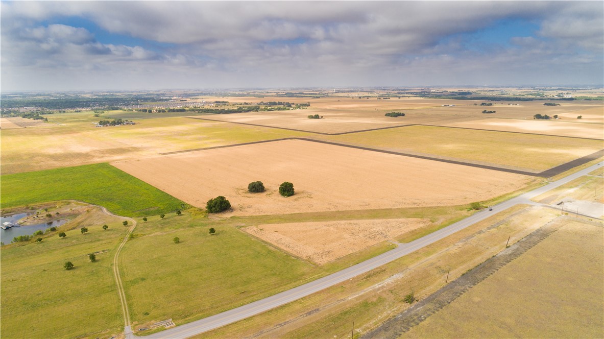 14417 Chandler Road Taylor, TX 76574 - Photo 11 of 16 a view of an ocean and a mountain