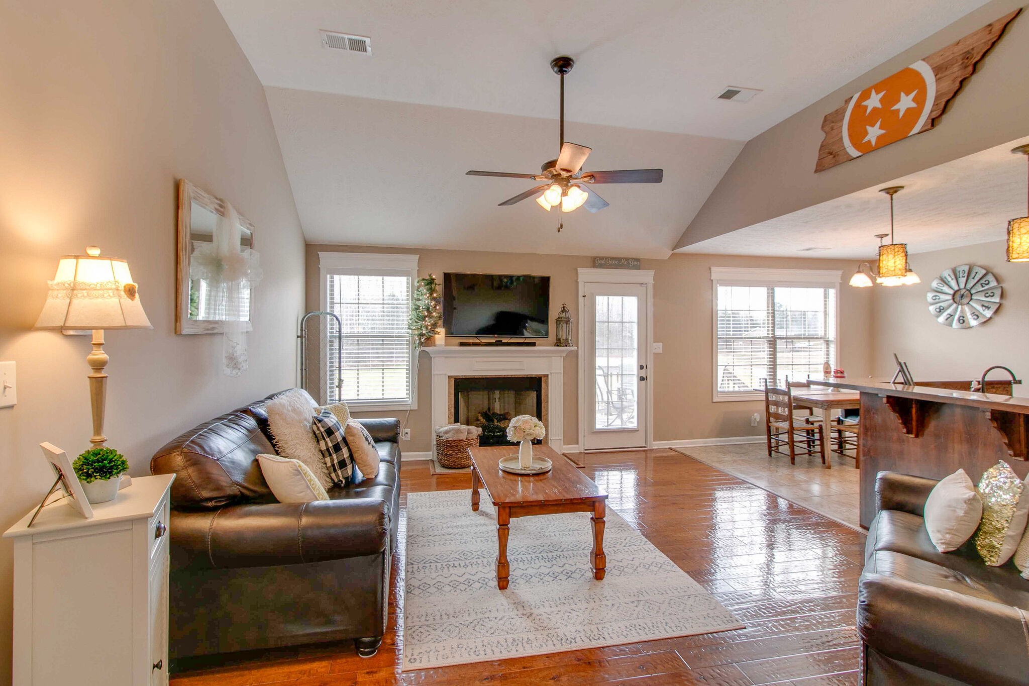 2312 River Road Clarksville, TN 37040 - Photo 20 of 25 a living room with furniture a fireplace and a flat screen tv