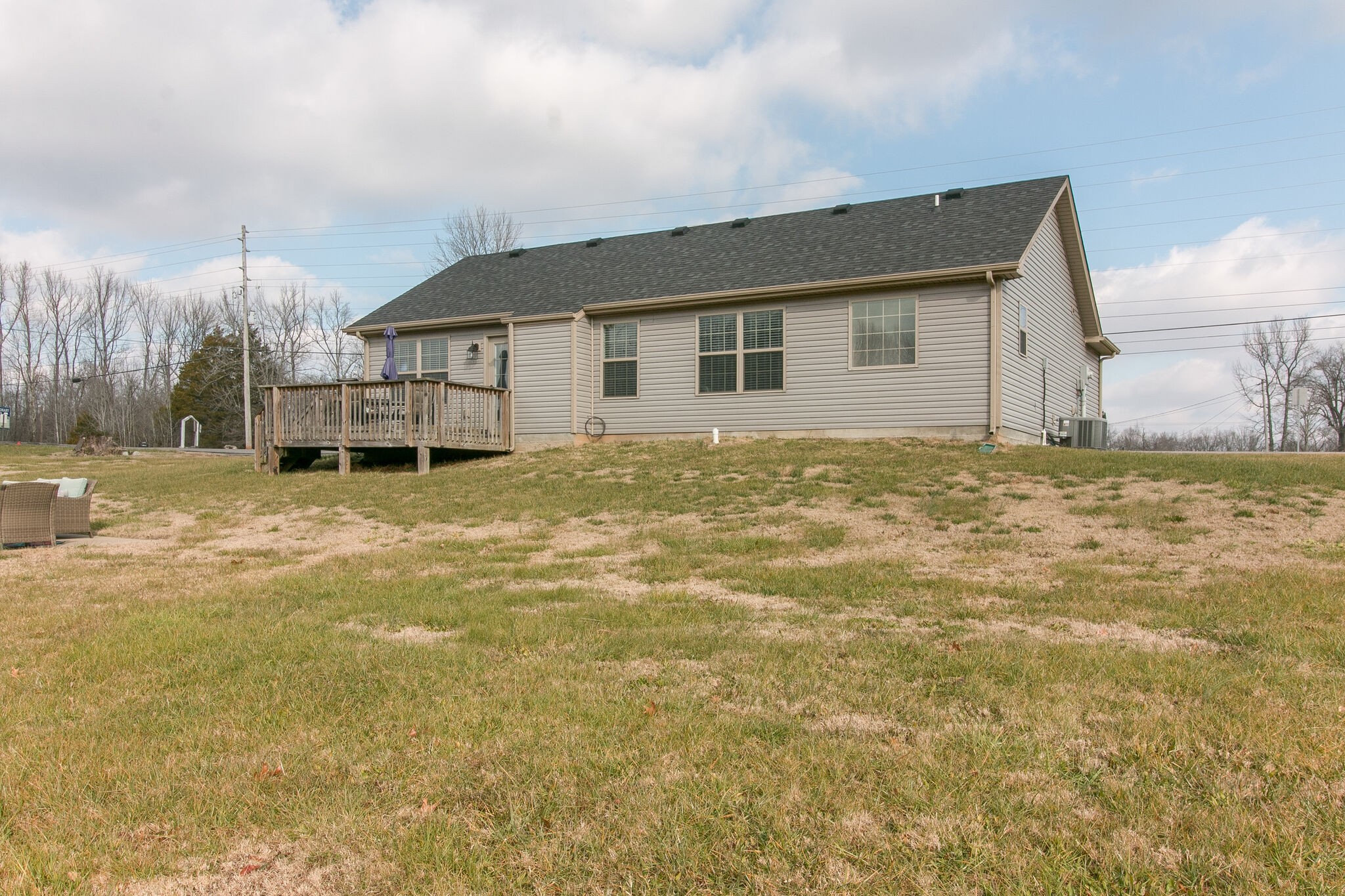 2312 River Road Clarksville, TN 37040 - Photo 2 of 25 a white house that has a big yard and a big yard