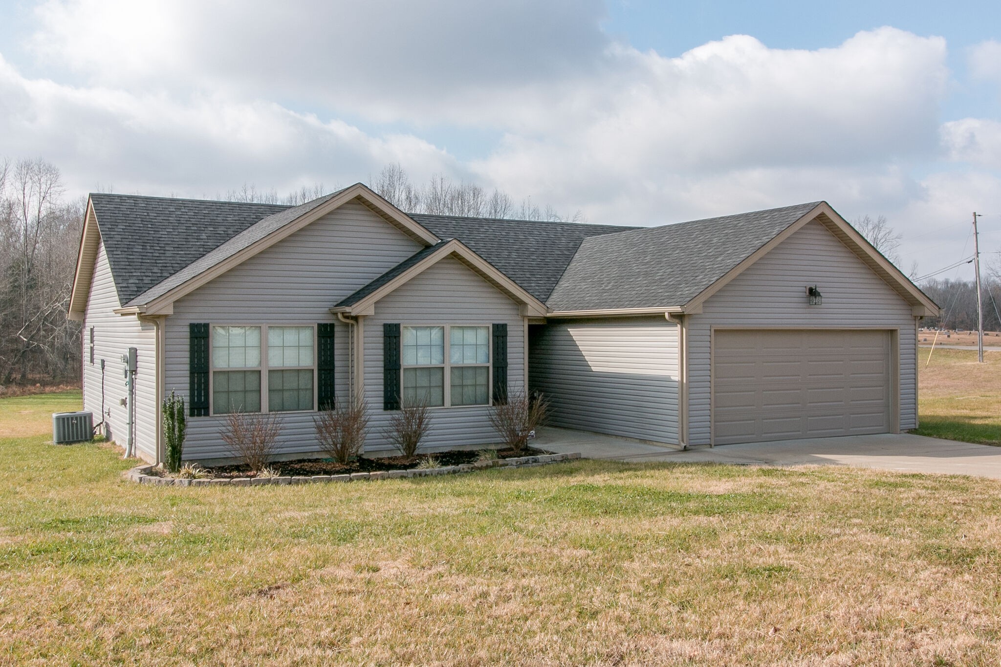 2312 River Road Clarksville, TN 37040 - Photo 24 of 25 a front view of a house with a yard