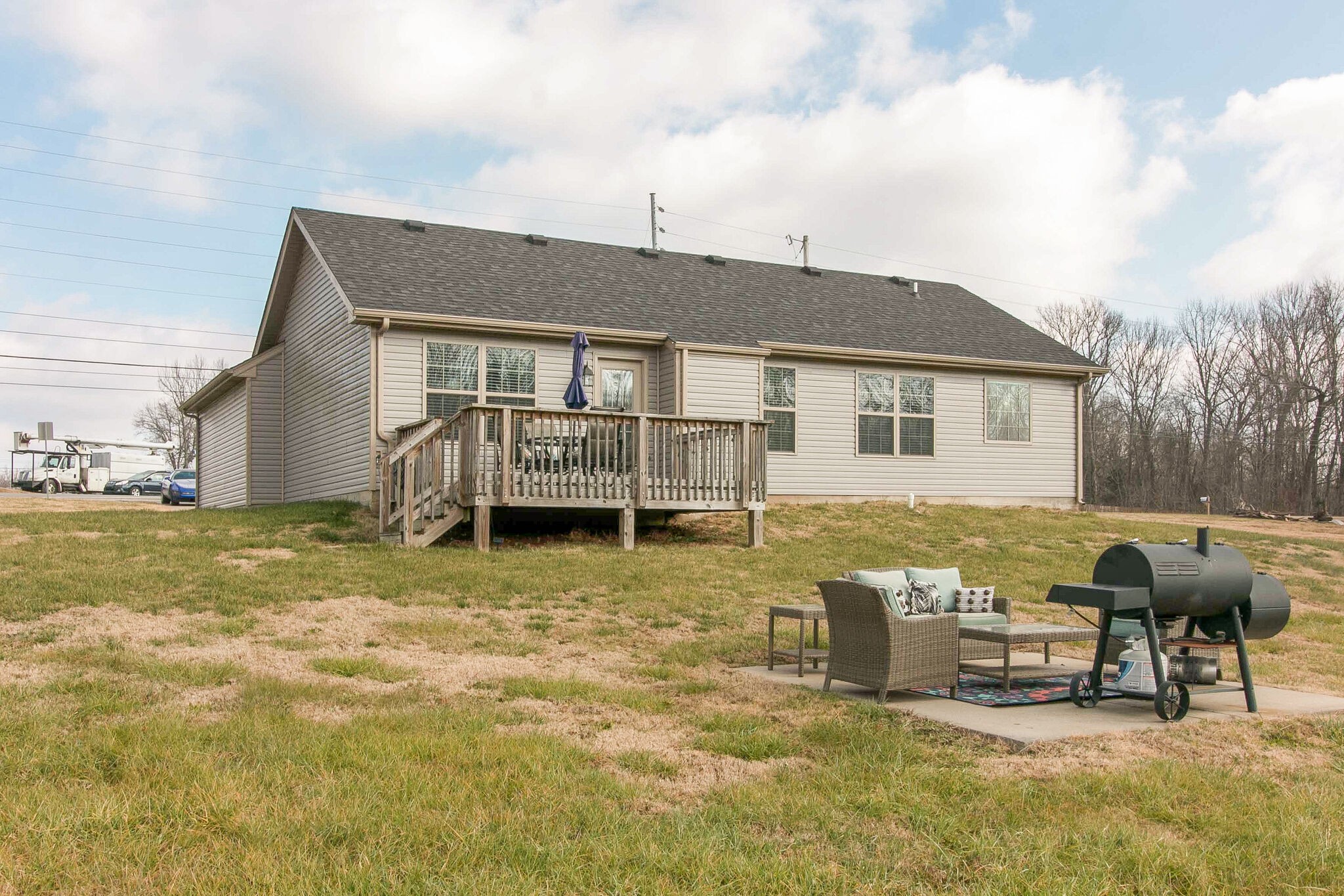 2312 River Road Clarksville, TN 37040 - Photo 5 of 25 a view of a house with backyard porch and furniture