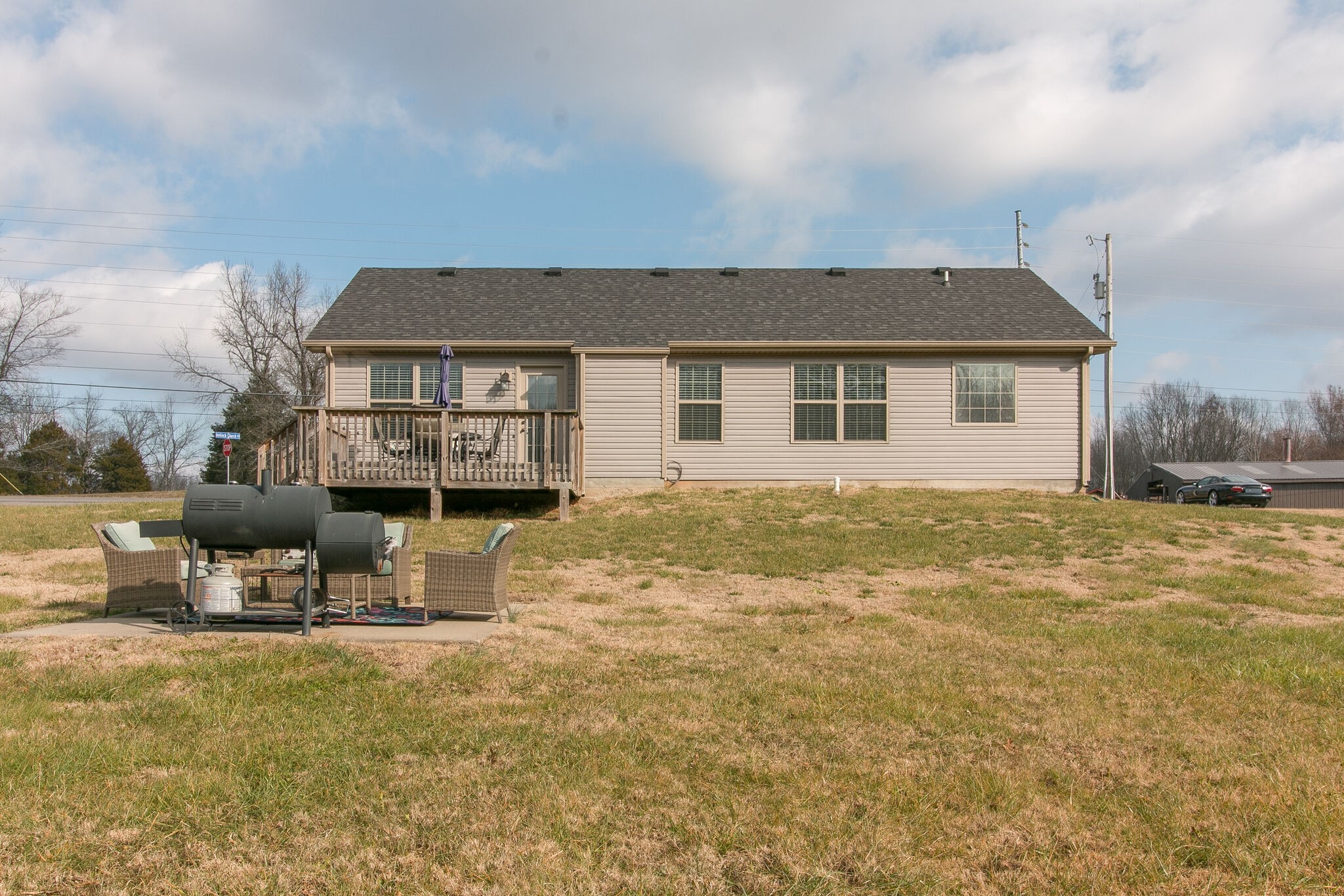 2312 River Road Clarksville, TN 37040 - Photo 6 of 25 a backyard of a house with table and chairs