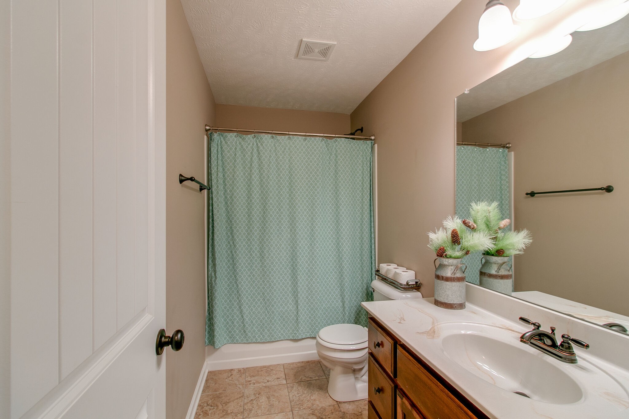 2312 River Road Clarksville, TN 37040 - Photo 7 of 25 a bathroom with a sink toilet and shower
