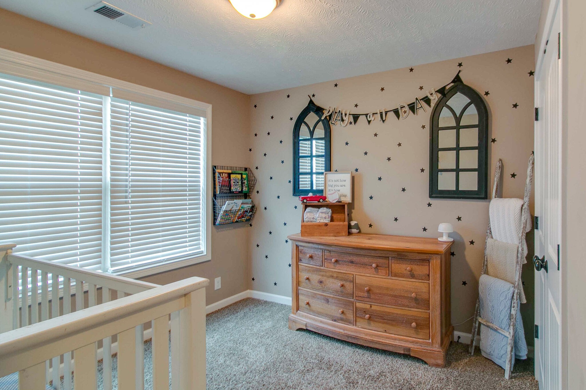 2312 River Road Clarksville, TN 37040 - Photo 8 of 25 a bed room with a bed and a baby crib