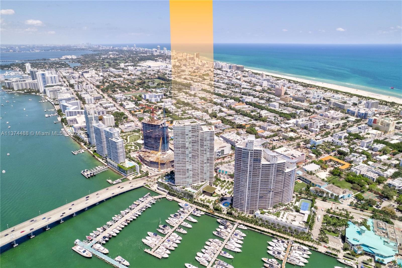 450 Alton Road, Unit 806 Miami Beach, FL 33139 - Photo 1 of 33 a view of a city with tall buildings