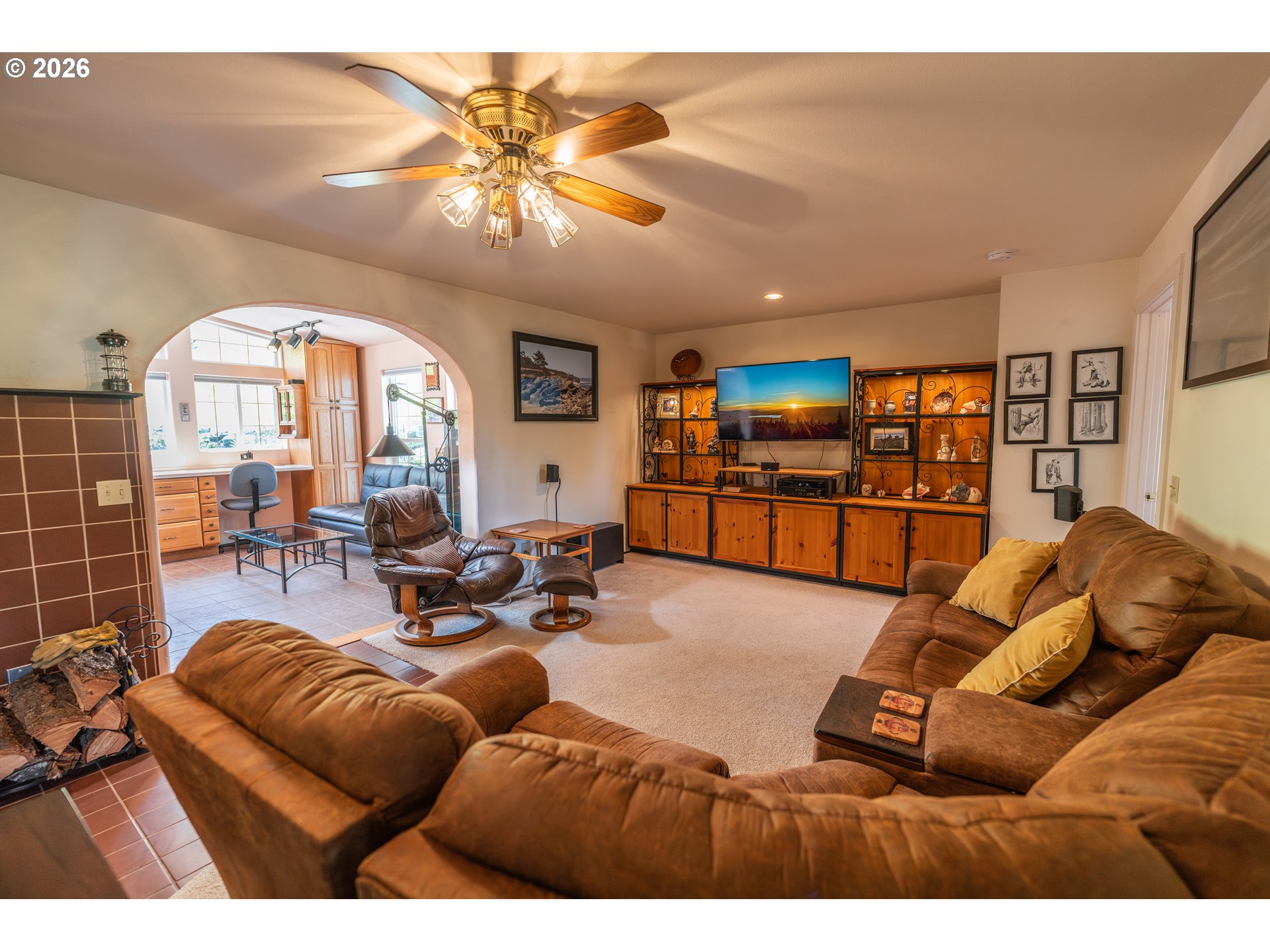 489 Fir Vista Road Sutherlin, OR 97479 - Photo 11 of 47 a living room with furniture and a flat screen tv