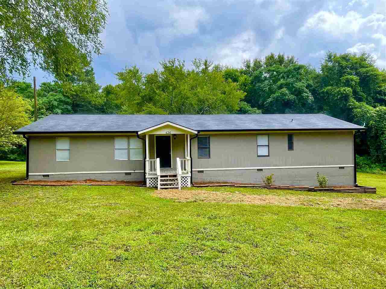 436 Elberton Road Lexington, GA 30648 - Photo 1 of 1 a front view of a house with garden