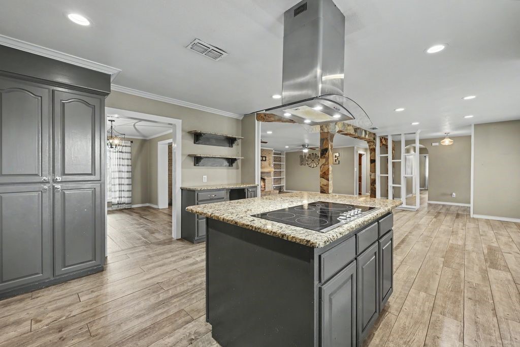 4005 Ridge Trail Robstown, TX 78380 - Photo 9 of 37 Kitchen island with cook top