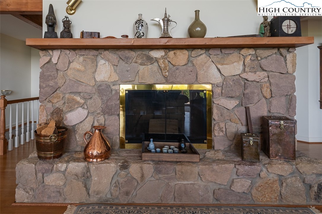 148 Chestnut Ridge Lane Glade Valley, NC 28627 - Photo 11 of 50 a view of a wooden door with a table and chairs