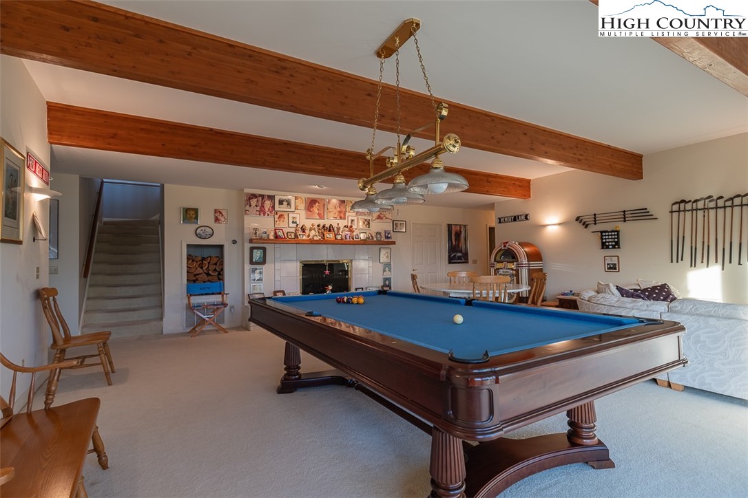 148 Chestnut Ridge Lane Glade Valley, NC 28627 - Photo 27 of 50 a room with pool table and windows