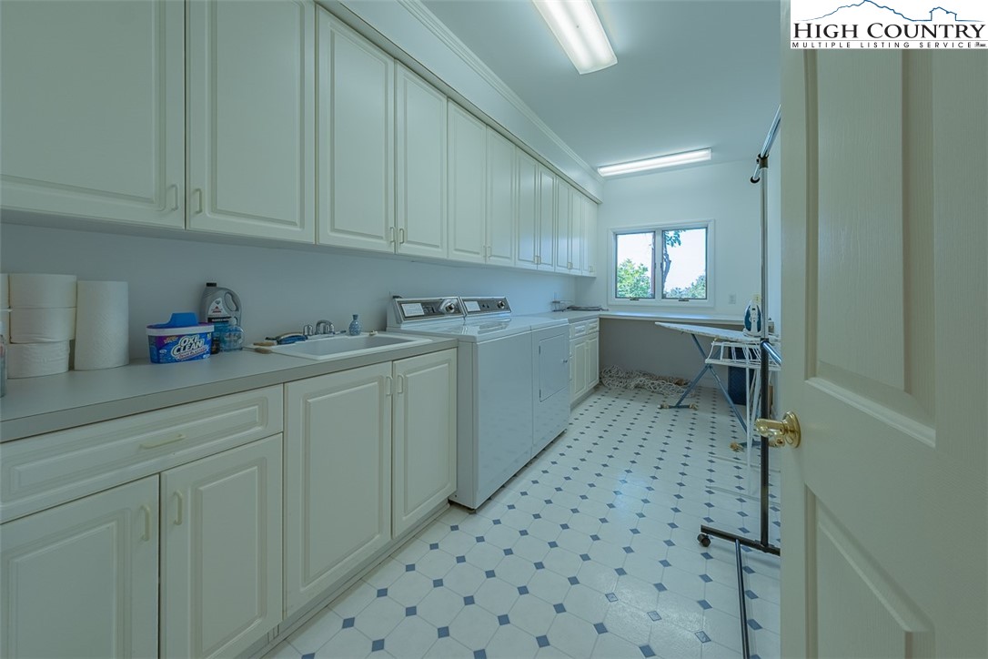 148 Chestnut Ridge Lane Glade Valley, NC 28627 - Photo 28 of 50 a room with a window and cabinets