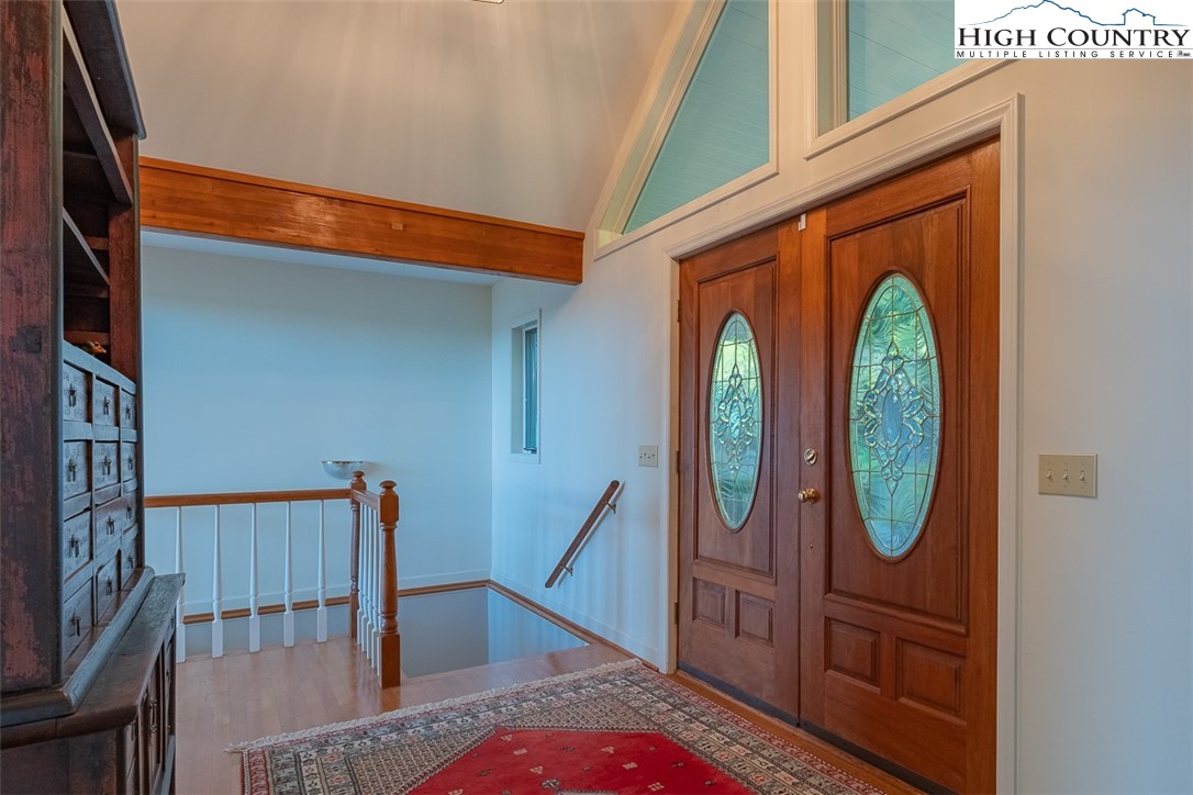 148 Chestnut Ridge Lane Glade Valley, NC 28627 - Photo 8 of 50 a front view of a house with garden