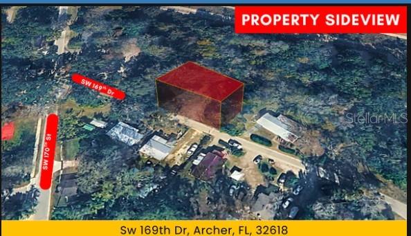 Southwest 169th Drive Archer, FL 32618 - Photo 3 of 8 a picture of street red and red white house