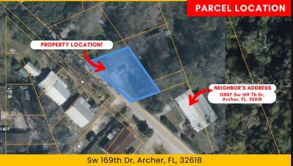 Southwest 169th Drive Archer, FL 32618 - Photo 5 of 8 a street sign that is on a street