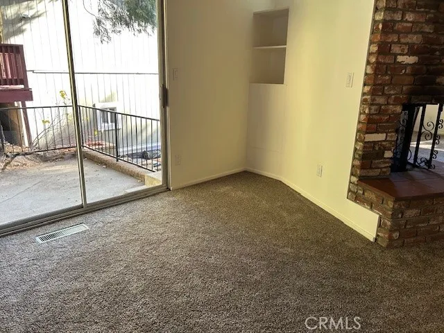 a bathroom with a shower and a toilet