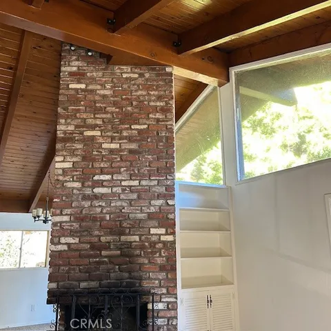 a living room with stainless steel appliances kitchen island granite countertop a large kitchen counter top and oven