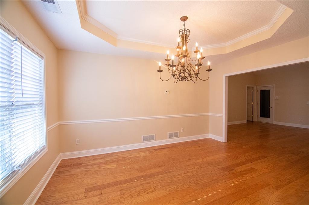 2545 Rosehill Circle Lithia Springs, GA 30122 - Photo 17 of 27 a view of a room with window and chandelier